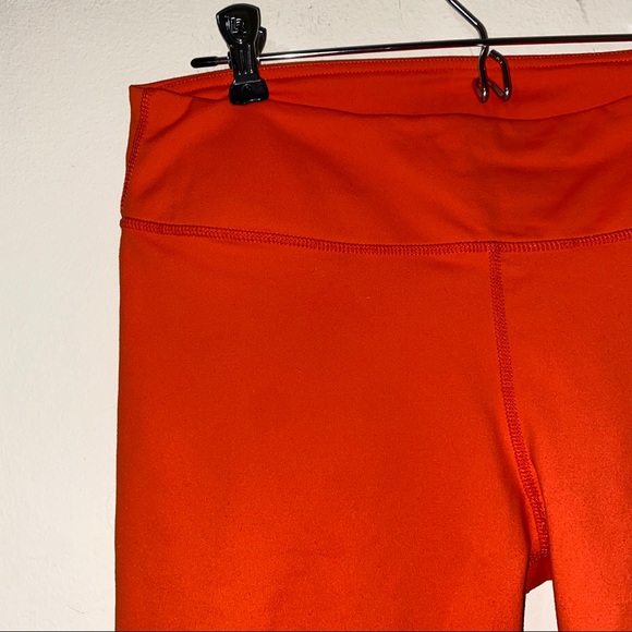 Fabletics orange mid rise power hold cropped pants - Picture 4 of 9